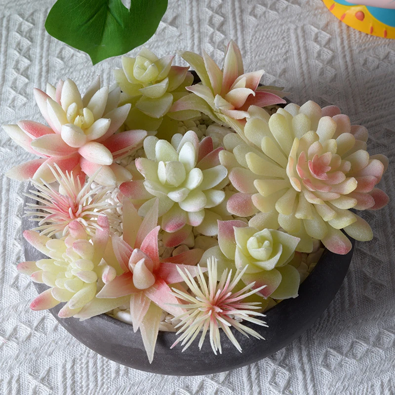 Available styles of assorted cream and pink artificial succulent picks