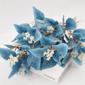 Close-up of blue colored artificial eucalyptus spray