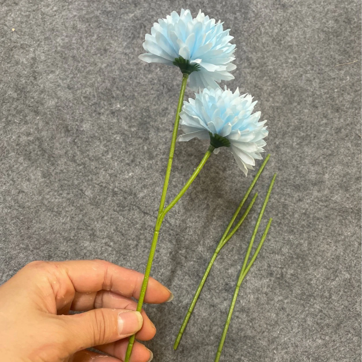 Green Forked Artificial Flower Stem arranged for decorative display