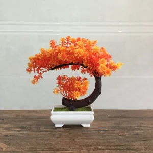 Orange potted artificial conifer bonsai tree