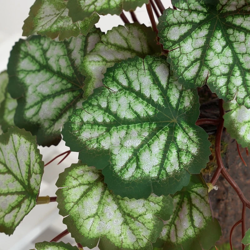 Close-up of green leaf detail for potted artificial coral bells plant