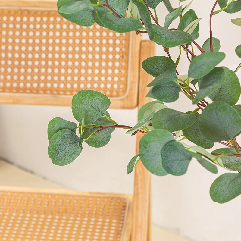 Close-up of green potted artificial eucalyptus tree collection