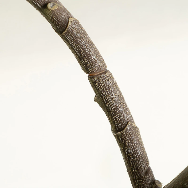 Close-up of potted artificial fiddle leaf fig tree collection