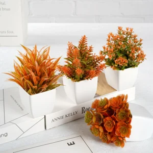 Potted Artificial Orange Greenery Plant arranged for decorative display