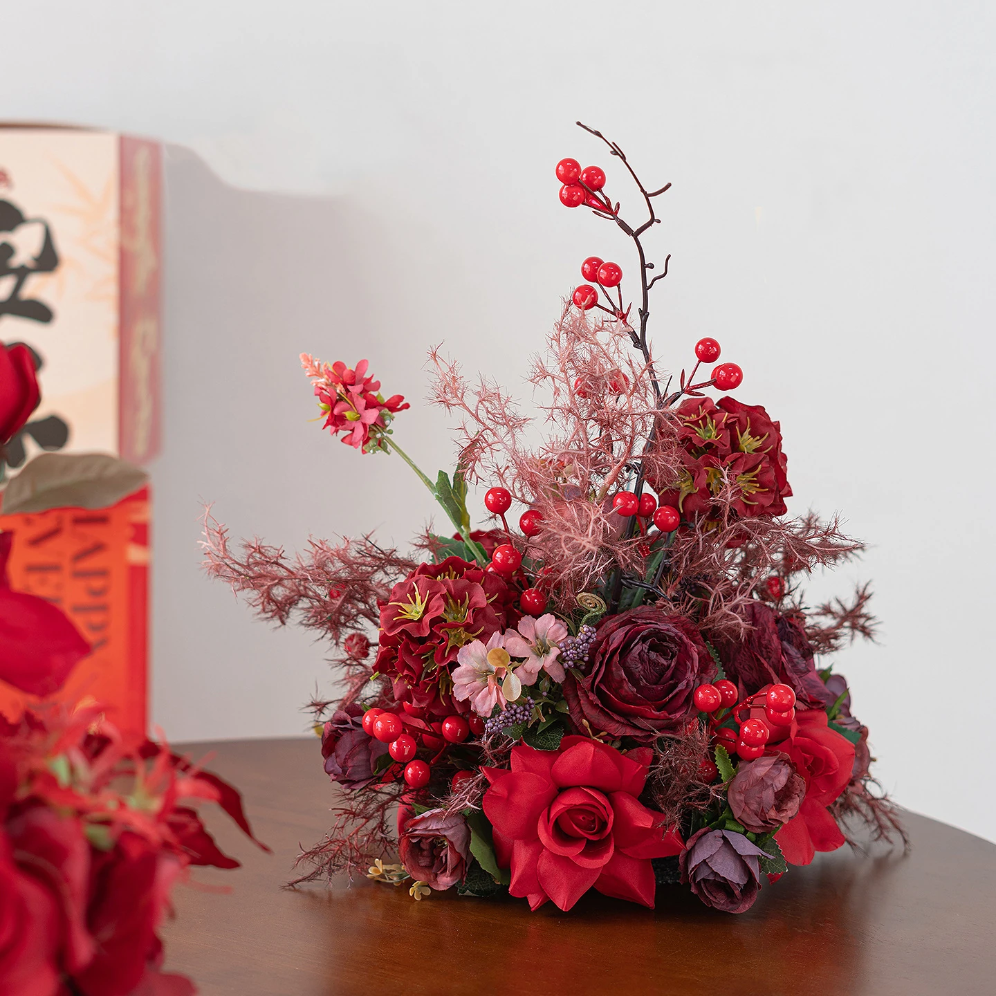Red Artificial Flower Table Arrangement Collection displayed for decorative use