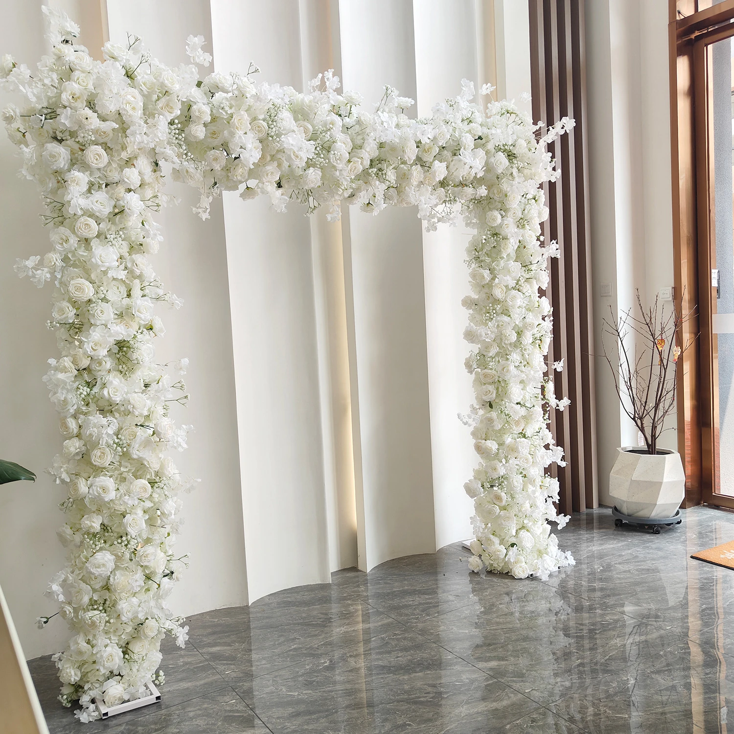 Alternate view of white rose hydrangea wedding flower arch