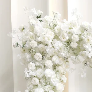 Close-up of white rose hydrangea wedding flower arch