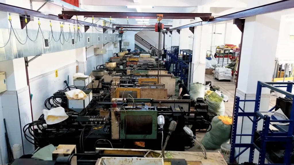 Elevated view of rows of production machinery inside the artificial flower factory.