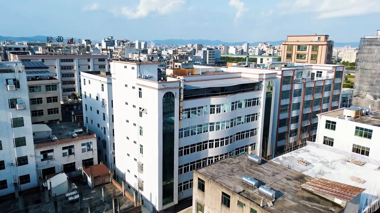 Aerial view of the factory building in Shantou and the surrounding industrial neighborhood.