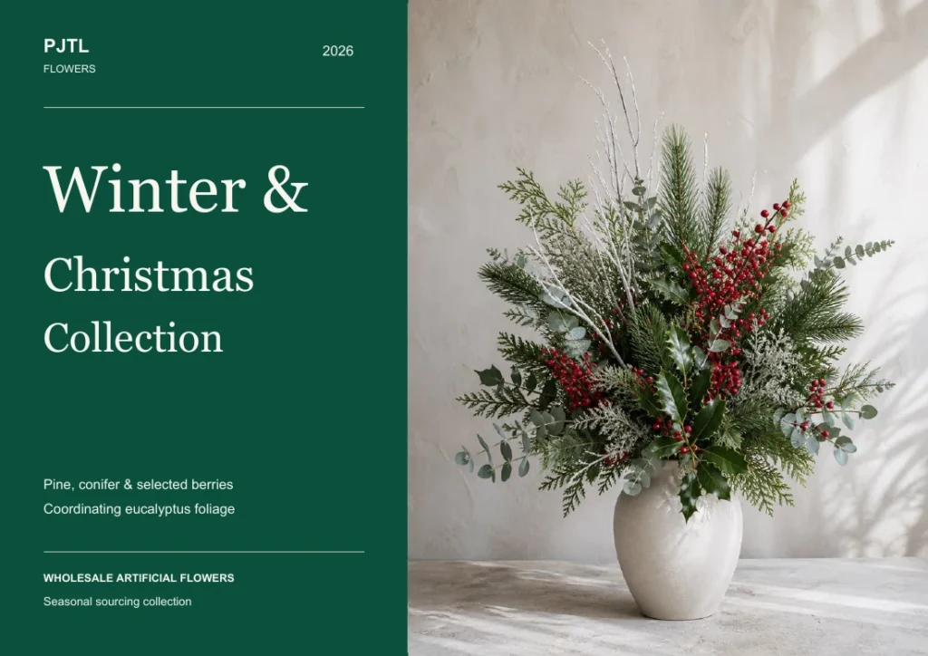 Winter and Christmas catalog cover featuring pine, eucalyptus and red berry branches